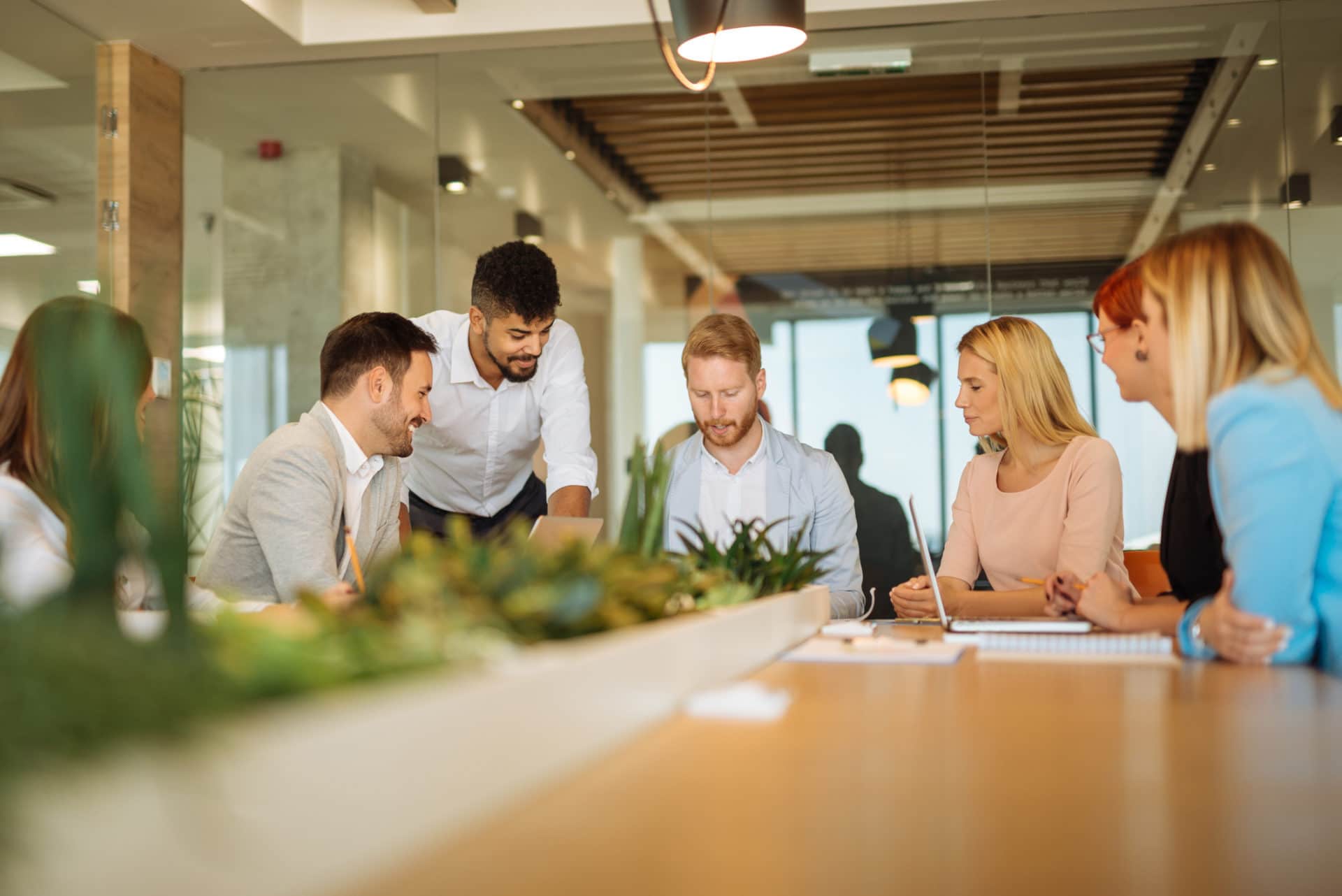 Colleagues having a meeting in a conference room.
