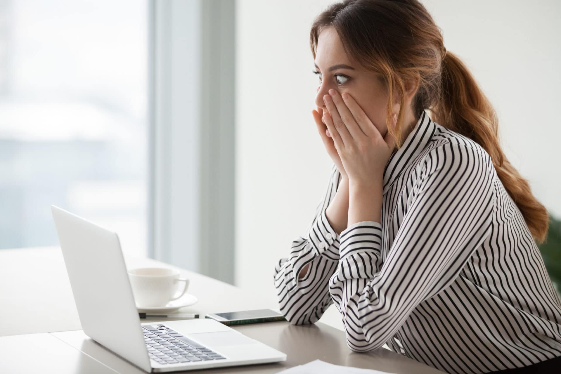 Businesswoman In Tennessee Reading About The FBI's 2019 Internet Crime Report
